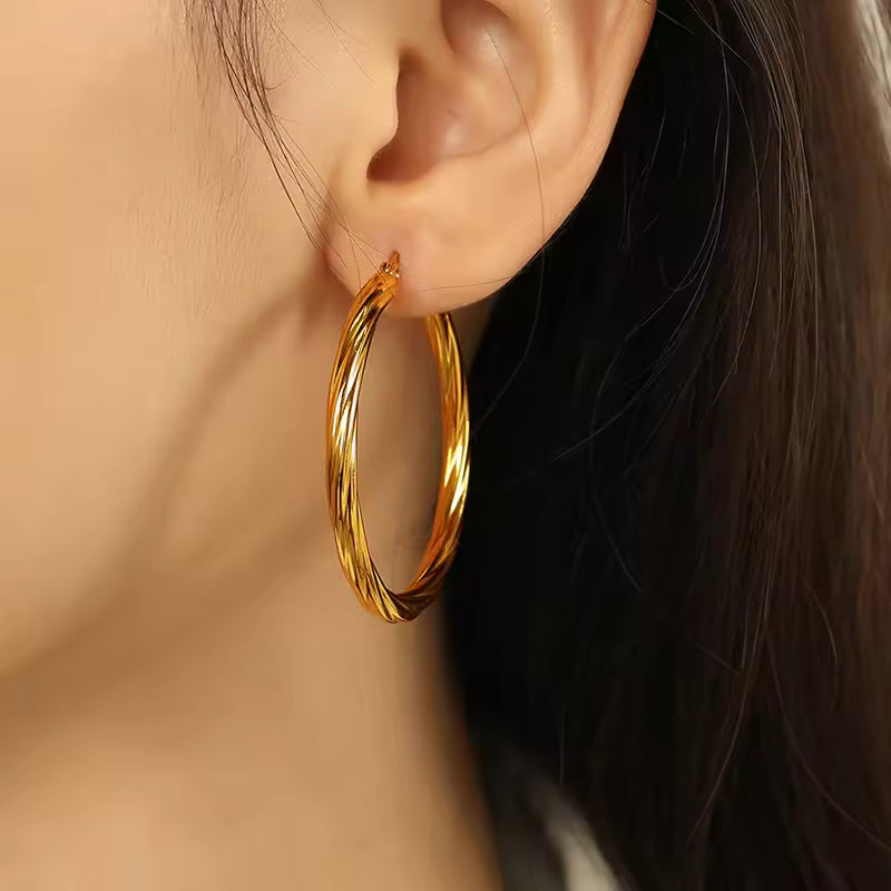 “Twilight Twist” Gold Hoops